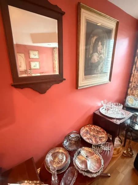 Ornate dark wood wall mirror