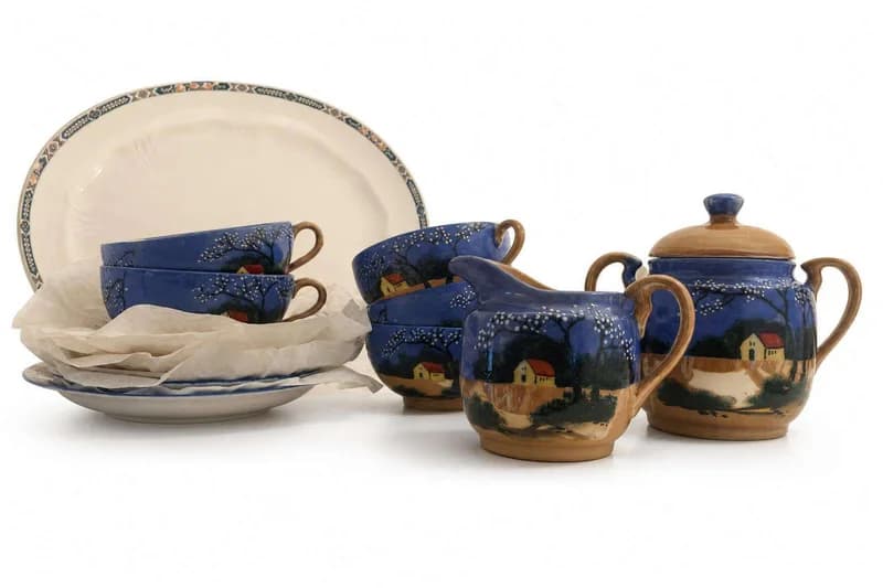 Unmarked hand-painted blue scenic pottery tea set