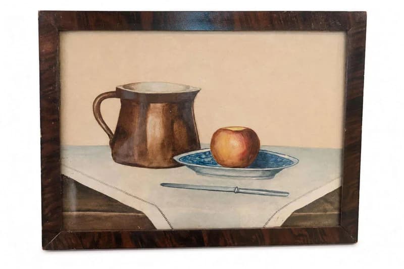 Framed still life painting of a copper pitcher, apple, and blue plate