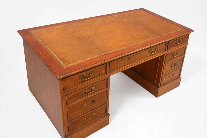Antique oak partners desk with leather top and brass hardware