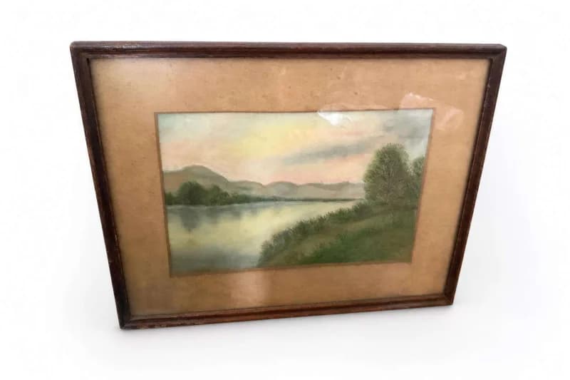 Framed landscape pastel or print of river, mountains, and trees